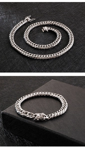 Detailed close-up of 925 sterling silver Cuban link chain with secure box clasp