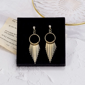 Golden tassel drop earrings with sparkling rhinestones and geometric circular design