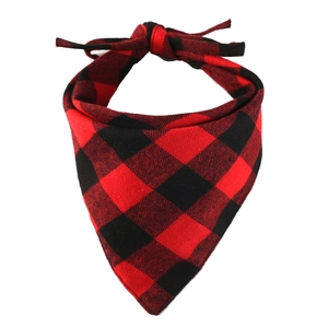 Close-up of red and black buffalo plaid cotton dog bandana with a classic knotted design