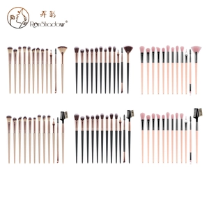 Macro display of 12pcs professional makeup brush sets in champagne, black and pink colors