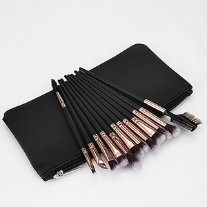 Detail of 15-piece makeup brush set with rose gold ferrules and black zipper travel case