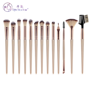 Detail showing 13 champagne gold makeup brushes with rose gold ferrules and soft bristles