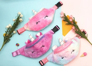 Three plush unicorn waist bags in pink and purple colors with sequined horns and ears
