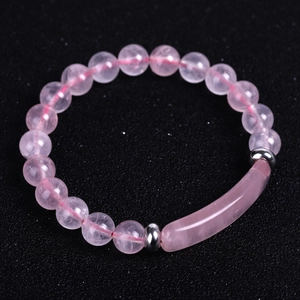 Detail of pink crystal beaded bracelet with central bar stone and silver spacers