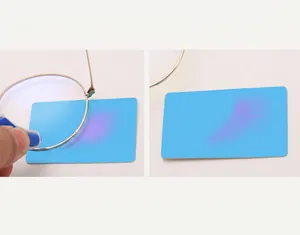 Detailed blue light blocking test with metal frame glasses and a laser testing kit