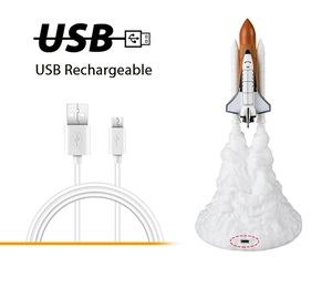 Detailed view of the space shuttle lamp with its USB charging port and cable included