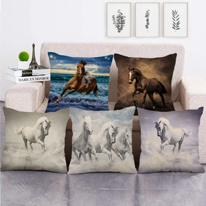 Set of five linen throw pillow covers featuring artistic horse patterns on a sofa