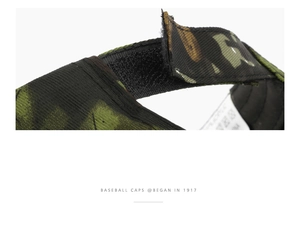 Detail view of the adjustable velcro strap and wash label on bionic leaf camo baseball cap