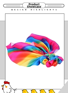 Detailed view of large rainbow gradient satin bow scrunchie with silky smooth fabric finish