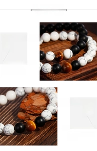 Detailansicht der 8mm matten schwarzen Achat-, Marmor- und Tigerauge-Perlen am Armband