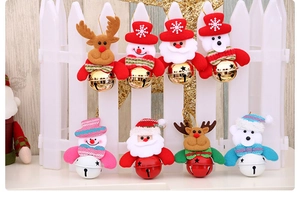 Detail of plush Christmas bell ornaments featuring Santa, snowman, reindeer and bear styles