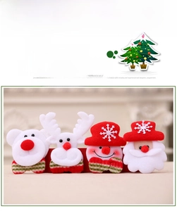 Set of four LED Christmas brooches featuring Santa, Snowman, Reindeer, and Polar Bear figures