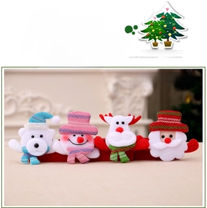Set of four plush Christmas glowing brooches featuring Santa, snowman, bear, and reindeer