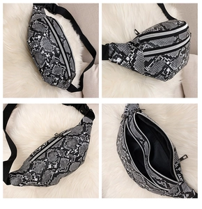 Detail showing snake print waist bag with dual zip compartments and adjustable strap