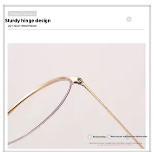 Detailed macro view of the reinforced light alloy metal hinge on gold round glasses frames