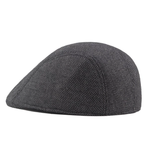 Classic dark grey herringbone tweed newsboy cap with vintage British retro style