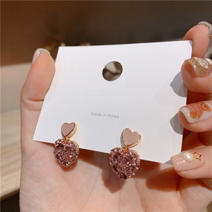 Pink heart-shaped drop earrings with pavé rhinestones in a Korean fashion style