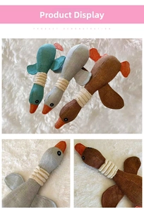 Detailed view of plush wild goose dog toys in blue grey and brown with linen texture
