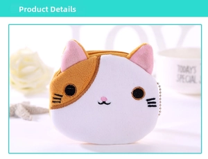 Detail of cute cat plush coin purse with orange and white fur and metal chain