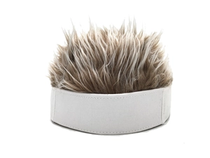 Detail of white cotton brimless hat with brown spiked synthetic wig fibers for party decor