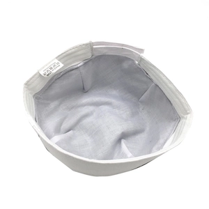 Detail view of the 100% cotton inner lining and stitching of the white brimless dockers hat