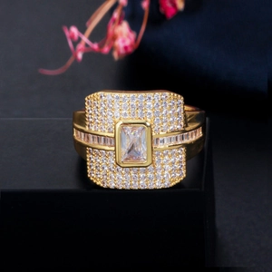 Macro shot of 18K gold plated ring with rectangular zircon and pave diamond details