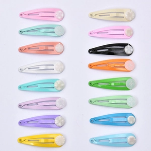 Detailed set of 16 colorful snap hair clips with small marble pattern round ornaments