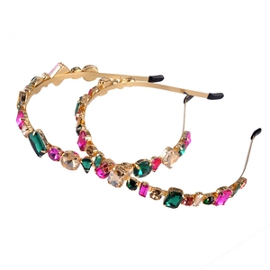 Fashionable thin gold metal headband with colorful rhinestones in pink and green