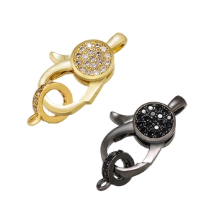 Detail of 18K gold and gunmetal lobster clasps with micro-set zircon for DIY necklaces