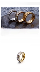 Detail showing the Love Only You engraving and small diamond on the 8mm steel ring band