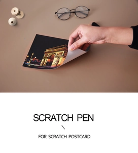 Detail view of scratch postcard tool set featuring black coating postcards and stylus