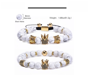 Detailed spec view of 8mm white turquoise beaded bracelets with adjustable crown charms