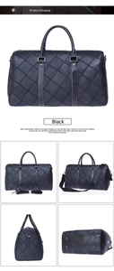 Detail view of black quilted leather duffel bag with shoulder strap and metal feet