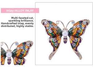 Detailed close-up of butterfly brooch with colorful enamel wings and crystal inlay
