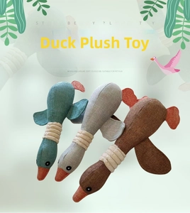 Detailed view of linen wild goose plush squeaky toys for small to medium dogs in three colors