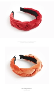 Detail of braided velvet headbands in red and orange with non-slip black inner lining