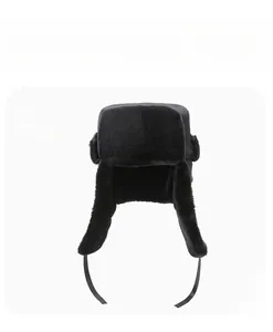 Front view of black faux fur winter trapper hat with ear flaps for windproof warmth