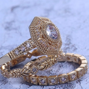 Elegant gold-finished stackable ring set with hexagonal halo and zircon micro-pave detailing