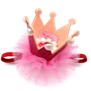 Pink and red glitter crown hat for dogs and cats featuring pearls and tulle for birthday party