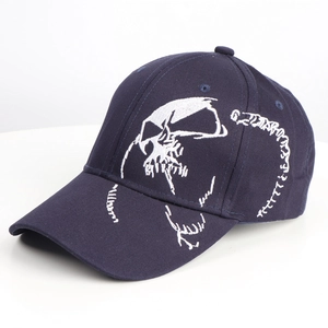 Navy blue baseball cap with white skull embroidery and curved brim for men and women