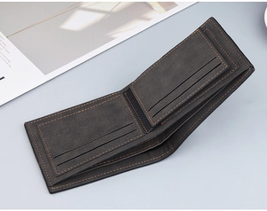 Detail of grey Saffiano wallet with orange stitching and multiple interior card slots