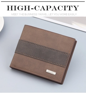 Detail view of a vintage men's wallet with large capacity and bifold brown leather texture