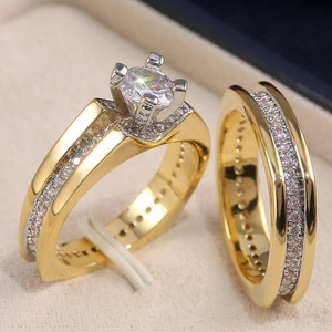 Macro detail of luxury two-tone gold ring set with AAA zirconia in a velvet box