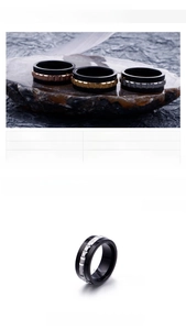 Detail view of 8mm wide stainless steel rings in gold, silver, and rose gold finishes