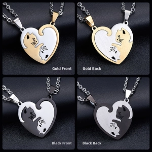 Detailed views of interlocking cat heart necklaces with brushed metal finish for couples
