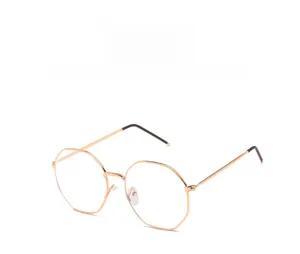 Detailed view of rose gold geometric polygonal metal spectacle frame with black temple tips