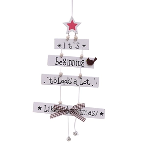 Four-tier wooden Christmas tree ornament with red star and It's Beginning to Look Like Christmas