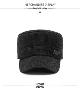 Macro shot of dark grey winter cadet cap showing thick knitted texture and NP metal logo