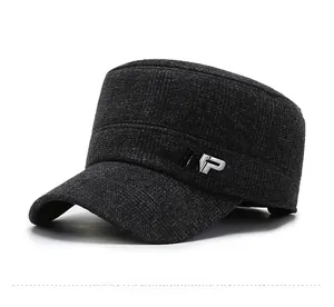 Detail view of winter cadet hat with plush lining and decorative NP metal logo side