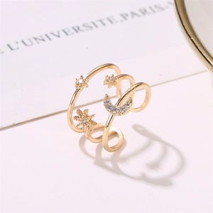 Three-layer open ring featuring sparkling star and moon motifs with zircon inlay